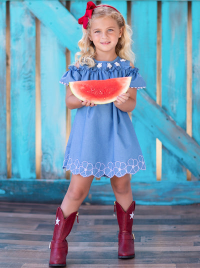 Girls lightweight denim dress has cold-shoulder style straps with daisy applique, floral embroidery at the hem, and back zipper 2T-10Y