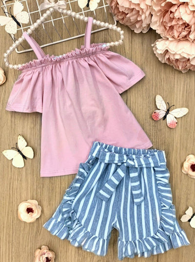 Girls set features an off the shoulder pink top with striped  blue white ruffled shorts with a sash
