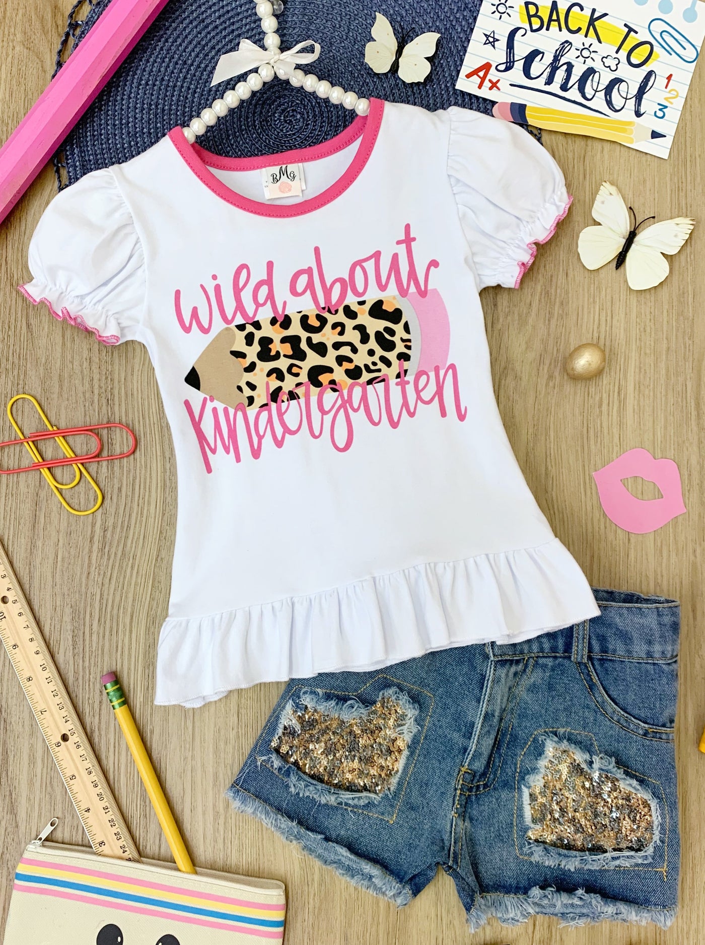 Little girls back to school "Wild About Kindergarten" ruffle top with leopard print graphic and leopard print sequin patched denim shorts - Mia Belle Girls