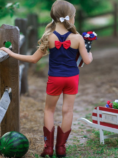 Girls Set features "Little Miss America" graphic racerback tank with a bow on the back and sequin shorts with a center bow