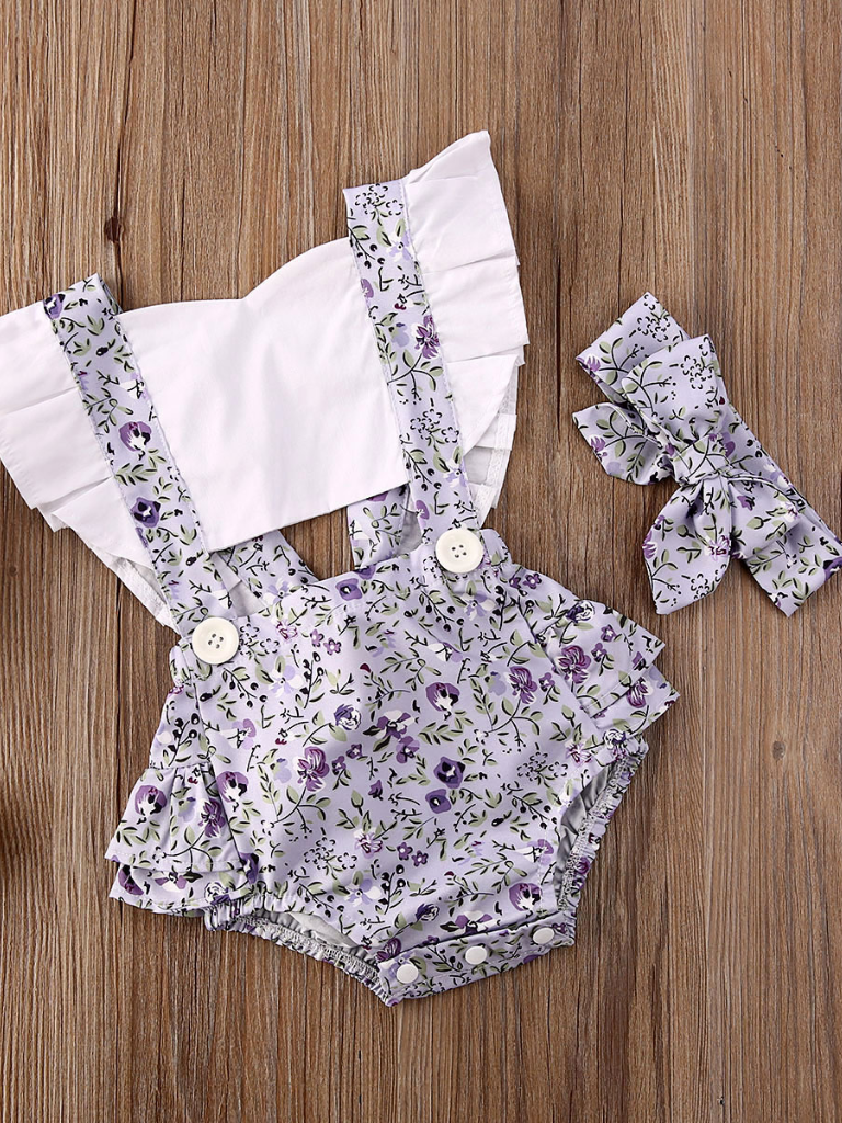 Baby overall style onesie with ruffles on the bum that ties in the back and a matching headband lilac