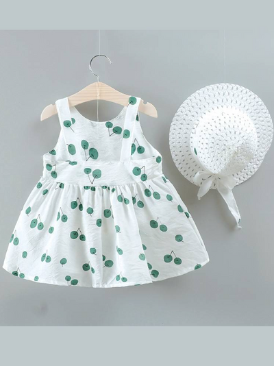 baby summer dress has an adorable cherry print and a large bow at the front and comes with a matching hat