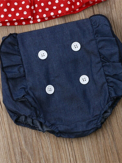 Baby set features a cropped top with polka dots and denim sailor-style bloomers