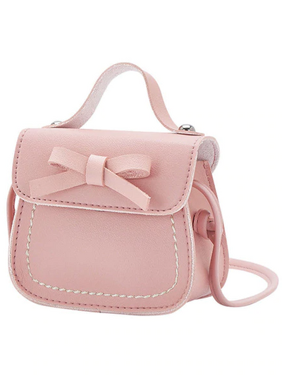 Girl with crossbody handbag with little bow pink