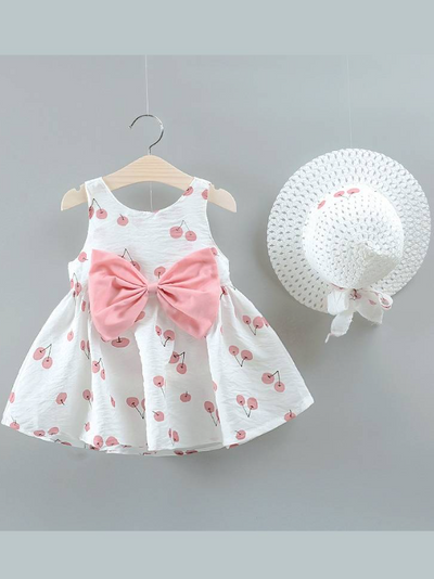 baby summer dress has an adorable cherry print and a large bow at the front and comes with a matching hat