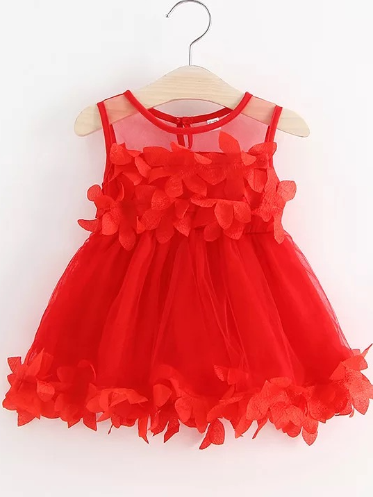 Baby tulle dress has flower applique on the bodice and dress hem red