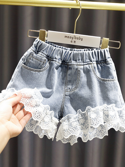 Girls shorts have an elastic waistband, front pockets, and a cute lace hem