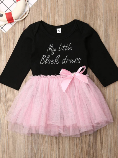 tutu dress has a long sleeved black bodice with "My Little Black Dress" in rhinestones and a tutu skirt pink