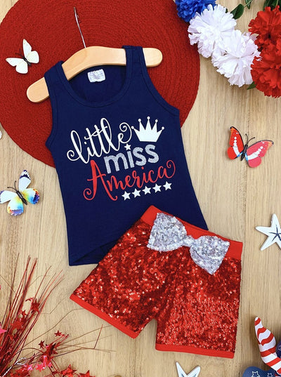 Girls Set features "Little Miss America" graphic racerback tank with a bow on the back and sequin shorts with a center bow 